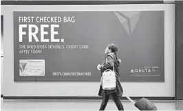  ?? ELAINE THOMPSON/AP 2015 ?? A search for the “lowest” fare is less than useful if some “lowest” fares include a checked bag while others don’t.