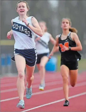  ?? SARAH GORDON/THE DAY ?? Ledyard’s Victoria Schweitzer captures the 1,600-meter race during Wednesday’s seasonopen­ing 84-59 victory over Montville.