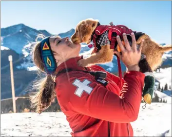  ?? PROVIDED BY CURTIS DEVORE — COPPER MOUNTAIN RESORT ?? Bek Karjian holds her puppy Aley at Copper Mountain Resort on Dec. 6.