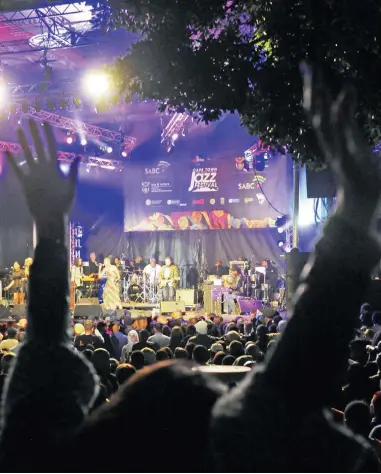  ?? PICTURE: COURTNEY AFRICA ?? STAGING A GOOD TIME: Artists perform on Greenmarke­t Square during last year’s free concert.