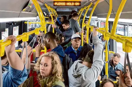  ?? Jessica Christian/The Chronicle 2019 ?? Making all Muni riders tap the card reader on buses and trains could curtail fare evasion.