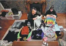  ?? PROVIDED TO CHINA DAILY ?? Profession­al organizers help people sort out wardrobes and get their homes in order.