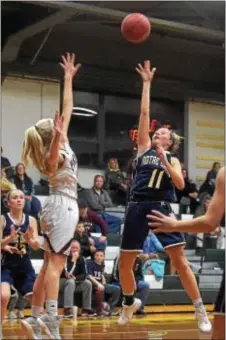 ?? PETE BANNAN — DIGITAL FIRST MEDIA ?? Notre Dame forward Mandy McGurk puts a shot up in the second quarter against Bonner-Prendie. McGurk had a game high 29 points including a three pointer and foul to take the game to overtime. Notre Dame won 77-69 in a thrilling game.