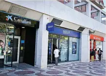  ?? ?? Oficinas bancarias en una calle de Madrid.