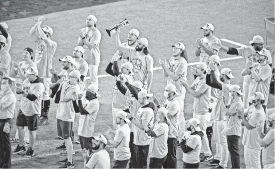  ?? JEROME MIRON/USA TODAY SPORTS ?? The Dodgers celebrate winning the NL pennant, their third in four years.