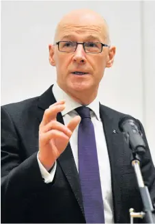  ??  ?? Deadline deferral Education secretary John Swinney