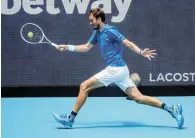  ?? Picture: MIKE FREY/ USA TODAY SPORTS ?? FIFTH FINAL: Daniil Medvedev hits a forehand against Jannik Sinner in the men’s singles final of the Miami Open at the Hard Rock Stadium in Miami, Florida, on Sunday