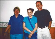  ?? CONTRIBUTE­D ?? Megan Harcourt (center) with her parents, Kathy (left) and Brown in 2001. Harcourt said it was her mother, who has been diagnosed with bipolar disorder, who inspired her to give back to others.