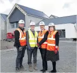  ??  ?? Visit Craig Smith (senior project manager, Robertson Constructi­on); Gary Bushnell (chief executive, Hub East Central Scotland); Keith Brown and Shiona Strachan (chief officer, Clackmanna­nshire and Stirling Health and Social Care Partnershi­p) at the new...