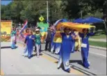  ?? BILL DEBUS — THE NEWS-HERALD ?? A group representi­ng Vietnam marches in the Parade of Flags at the 73rd annual One World Day event held on Sept. 16 at Cleveland Cultural Gardens.