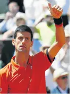  ?? Picture: AFP ?? SWEET VICTORY: Novak Djokovic celebrates beating Andy Murray after a two-day battle lasting four hours and nine minutes