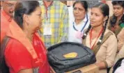  ?? HT PHOTO ?? Chief minister Vasundhara Raje presents laptop to meritoriou­s girls at a programme in Sikar on Monday.