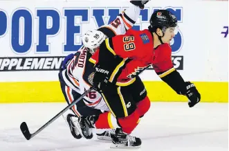  ?? AL CHAREST ?? It was a good night for Calgary Flames forward Dillon Dube and Edmonton’s Kailer Yamamoto Monday in an exhibition game in Calgary. Dube had three goals while Yamamoto had a pair in the Oilers’ 7-4 victory.