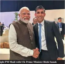  ?? ?? Indian PM Modi addresses delegates at COP28. On right PM Modi with UK Prime Minister Rishi Sunak