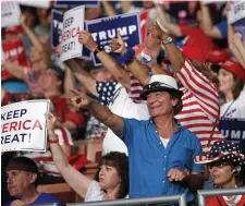  ?? MATT STONE / HERALD STAFF ?? FOUR MORE YEARS: Supporters attend President Trump’s campaign rally at the SNHU Arena in Manchester, N.H., Thursday.