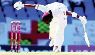  ?? AP ?? West Indies’ Shai Hope plays a shot from the bowling of England’s Ben Stokes during day two of the second Test cricket match at the Sir Vivian Richards Stadium in North Sound, Antigua and Barbuda, last February.