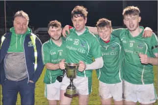  ?? Ahern) (Pic: John ?? LEFT: THAT WINNING FEELING: Former player and first aid medic to the Araglin team, Brendan Carey (left) pictured with players, l-r: Sean Hegarty, Liam Keane, Jack Kearney and Ben Carey, set to celebrate following the county final.