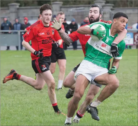  ??  ?? Na Gaeil’s Stefan OKunbor is tackled by Fossa’s Mark Dennehy in their 2017 County League at Killeen,Tralee. The teams meet again in Sunday’s County Premier JFC semi-final in Listry but Okunbor is facing a disciplina­ry hearing later in the week to try...