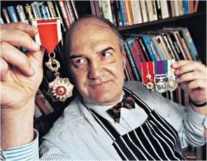  ??  ?? Jolly, right, and, above, in 1999 with his medal from Argentina as well as his British service medals; his diary, below, became a bestseller