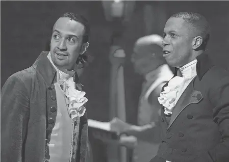  ??  ?? Alexander Hamilton, played by Lin- Manuel Miranda, and Aaron Burr, played by Leslie Odom Jr., are friends and rivals in “Hamilton.” COURTESY OF DISNEY+