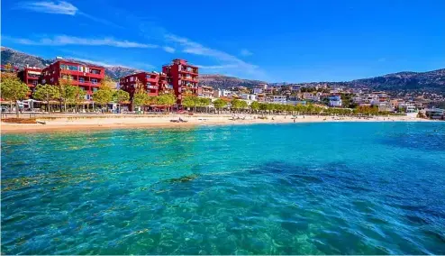  ?? ?? Lounge on the beach in Vlore, Albania.