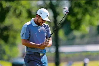  ?? DAVID J. PHILLIP/AP PHOTO ?? Xander Schauffele reacts after missing a birdie putt on the 18th green during the final round of the Charles Schwab Challenge on Sunday at the Colonial Country Club in Fort Worth, Texas.