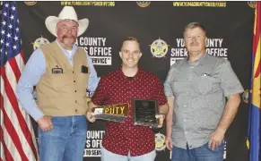  ?? PHOTOS COURTESY OF YCSO ?? ABOVE: Kenneth Allmon accepts the Deputy of the Year Award.