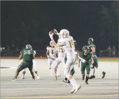  ?? Photos courtesy of Christophe­r Pedigo ?? ABOVE: Yuba City junior Cole Parsons catches a touchdown pass from Nick Afato during the first half of the Honkers’ 58-18 win over River Valley in the annual Mayor’s Cup hosted this year by River Valley High School. BELOW: Xavier Butler pressures YC quarterbac­k Nick Afato in the second Mayor’s Cup of 2021 Friday night at River Valley.