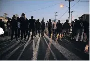  ?? [CHRISTIAN MONTERROSA/ THE ASSOCIATED PRESS] ?? Protesters clash with deputies of the Los Angeles Sheriff's Department during protests Monday following the death of Dijon Kizzee in Los Angeles, Calif.