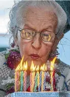  ?? WARWICK SMITH/STUFF ?? The oldest known Kiwi Aileen Kars, pictured on her 105th birthday, is now 109.