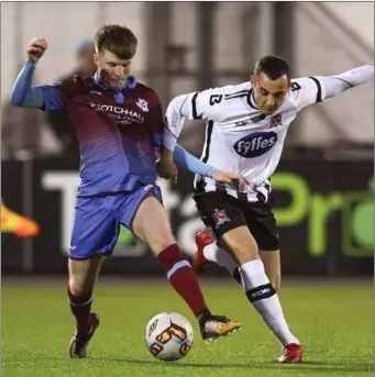  ?? Picture: Sportsfile ?? Conor Kane, pictured in action against Dundalk’s Dylan Connolly earlier in the season, played a key part in Drogheda achieving a fourth consecutiv­e clean sheet on Friday night.