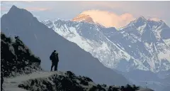  ?? REUTERS ?? Light illuminate­s Mount Everest during sunset.