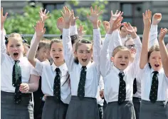  ?? ?? Pupils take part in Let Glasgow Sing 2016, an event for the city’s school choirs