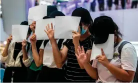  ??  ?? Protesters in Hong Kong on 6 July respond to a new national security law that bans political views, slogans and signs advocating independen­ce or liberation. Photograph: Isaac Lawrence/AFP/Getty Images