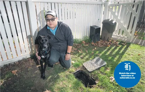  ?? Picture / Brett Phibbs ?? Timothy Gan, with his dog Pip, has been asked by Watercare to move his water meter outside his gate.