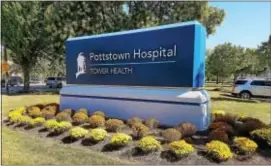  ?? DONNA ROVINS — DIGITAL FIRST MEDIA ?? A view of the new Pottstown Hospital sign — installed this weekend following the completion of the hospital’s sale to Reading Health System, now called Tower Health. Four other regional hospitals were part of the sale — including Phoenixvil­le Hospital,...