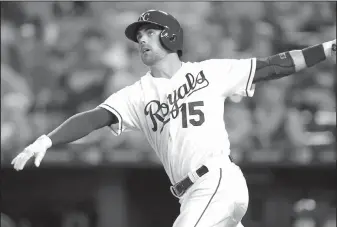  ?? AP/ORLIN WAGNER ?? Kansas City’s Whit Merrifield watches a solo home run off Detroit reliever Chad Bell on Thursday at Kauffman Stadium in Kansas City, Mo.