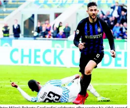  ?? AP ?? Inter Milan’s Roberto Gagliardin­i celebrates after scoring his side’s second goal during the Serie A match between against Spal at the San Siro Stadium in Milan, Italy, yesterday. Inter won 2-0.