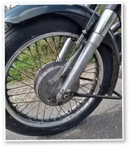  ??  ?? Simon’s AJS dates from 1955. A good year. The year in which AJS fitted full-width brakes to each end of the bike. They did of course use the same brake shoes as in their earlier half-width hubs…