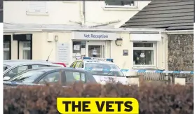  ??  ?? CORDONED-OFF Police vehicles in the car park outside Taylor Vets in Rutherglen THE VETS