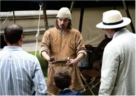  ??  ?? Above: James Dilley of Ancient Craft demonstrat­es bronze casting