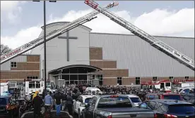  ?? JOHN MINCHILLO / ASSOCIATED PRESS ?? The casket of Detective Bill Brewer, a 20-year veteran of the Clermont County Sheriff’s Office, is brought out of Mt. Carmel Christian Church during funeral ceremonies Friday in Batavia. Authoritie­s in the Cincinnati region are reeling after the deaths of five police officers in less than two months.