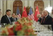  ?? PABLIO MARTINEZ MONSIVAIS — THE ASSOCIATED PRESS FILE ?? President Donald Trump, second from right, meets with China’s President Xi Jinping, second from left, during their bilateral meeting at the G20 Summit, in Buenos Aires, Argentina, on Saturday.