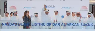  ?? — Supplied photo ?? Yousef bin Abdullah Al Shelash, Essa Kazim, Abdul Wahed Al Fahim, Hamed Ali and other executives celebrate the listing of Dar Al Arkan’s $500 million sukuk on Nasdaq Dubai.