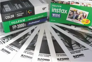  ??  ?? Instant print film and the popularity of darkroom printing are evidence of the joy from printing