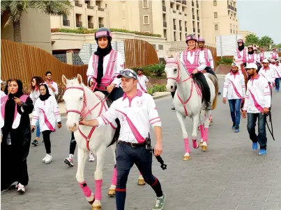  ?? Photo by Juidin Bernarrd ?? the Pink Caravan riders during their ride from the dubai Water Canal to the Etihad Museum on Friday. —