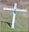  ?? ERIC MCCARTHY/JOURNAL PIONEER ?? A cross marks the spot in Pleasant View where 14-year-old Conor Shea lost his life.