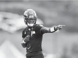  ?? JULIO CORTEZ/AP ?? Ravens quarterbac­k Lamar Jackson has taken leadership on the team on the field and through the dinner table.