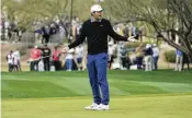  ?? ROSS D. FRANKLIN / AP ?? Scottie Scheffler reacts to missing an eagle putt attempt on the 15th hole during the second round of the Phoenix Open in Scottsdale, Ariz., on Friday.