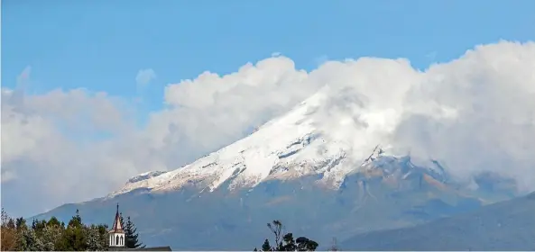  ?? PHOTO: SIMON O’CONNOR/FAIRFAX NZ. ?? Mt Taranaki’s powder coating is slowly creeping down to its lower slopes.